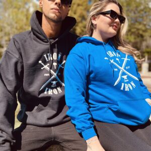 A girl along with a boy wearing a blue sweatshirt